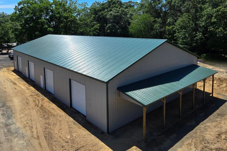 60×120 Commercial Green Pole Barn in Williamstown NJ with grey sides and white doors