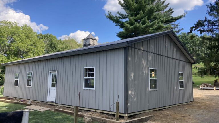 charcoal gray pole barn with black trim